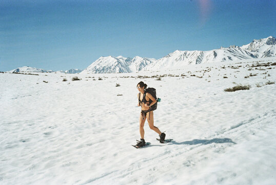 Woman snowshoeing 