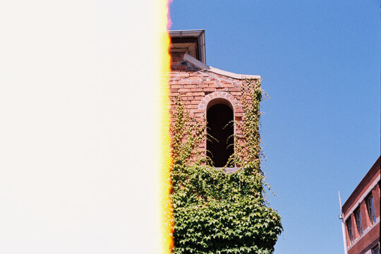 Film photography of a brick building with photo film error