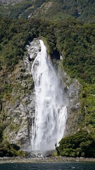 Milford Sound New Zealand waterfalls into the fjord
