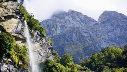 Milford Sound New Zealand waterfalls into the fjord