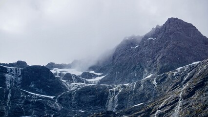 Milford Sound New Zealand misty waterfall mountains