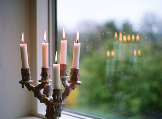 Lit Chandelier Brings Warmth and Coziness on a Rainy Day