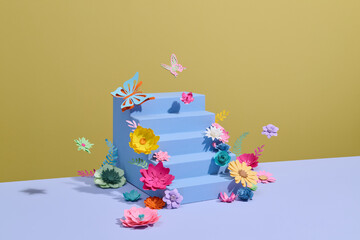 Vibrant Paper Flowers and Butterfly on Blue Steps