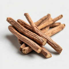 Rustic cinnamon sticks arranged aesthetically against a minimalist background for natural herbal remedies and wellness