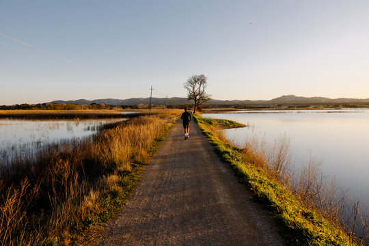 Fit man jogging to promote physical and mental well-being