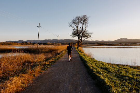 Healthy man jogging to maintain a good physical and mental state