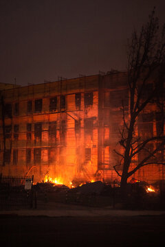 Apartment Building on Fire at Night