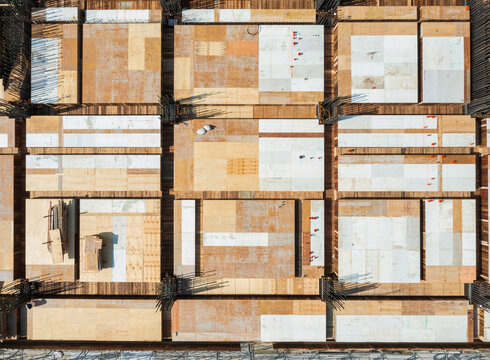 Aerial View of Construction Site with Concrete Covered Forms