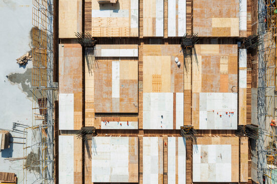 Aerial View of Construction Site with Concrete Covered Forms