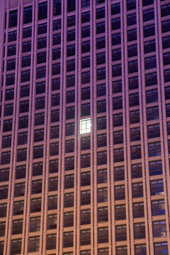 A building with only one illuminated window
