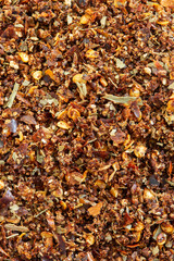 Dried piri piri or peri peri herb spice background backdrop. Culinary hot and spicy cookery condiment.
