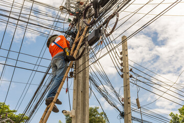 Working to install electric line