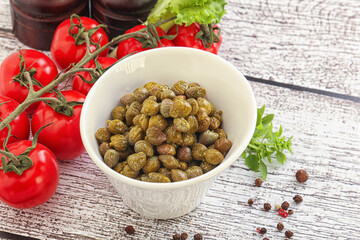 Marinated green capers in the bowl