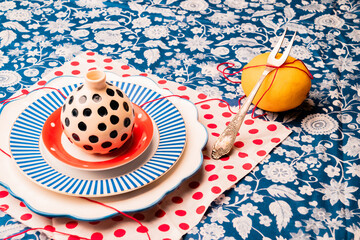 Still life with lemon and plates.