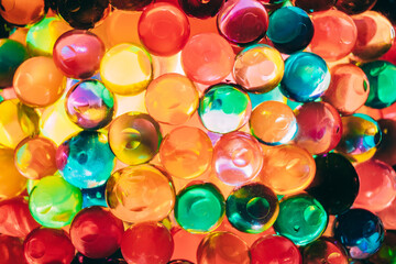 Colorful orbs create a vibrant abstract display with light effects