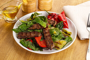 Salad with grilled beef steak