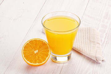 Sweet fresh orange juice in the glass