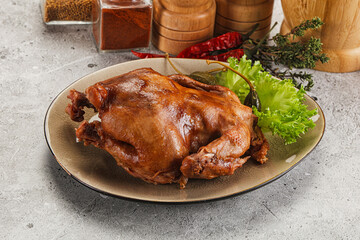 Baked small chicken with spices