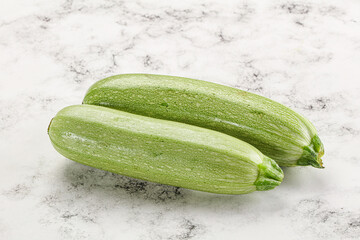 Raw green ripe zucchini vegetable