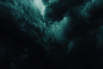 Fototapeta premium Dark sky with heavy clouds converging and a violent storm before the rain