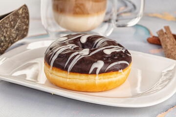 Delicous sweet donut with chocolate glaze