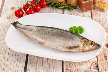 Raw whole salted herring fish