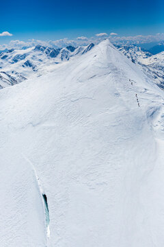 Mountaineers climbing mount Cevedale, Valfurva, Italy
