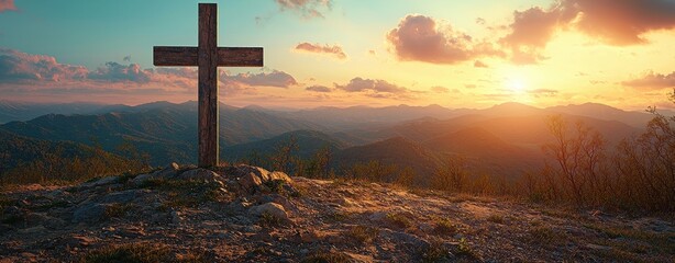 Solemn Cross on Hill at Sunset Silhouette Against Mountain Range Evoking Faith and Spirituality