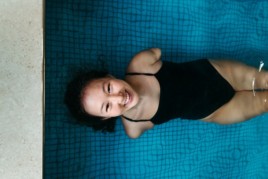 Joyful Swim in a Serene Pool