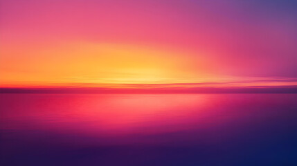 Fototapeta premium dusk with intense fiery shades of orange pink and purple stretching across the horizon 