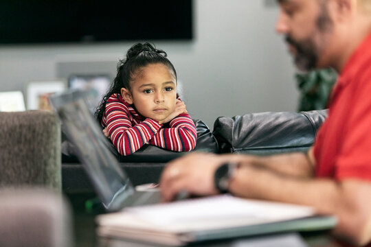 Home: Girl Annoyed That Parent Is Busy Working From Home