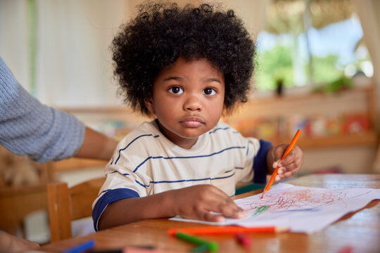 Little boy distracted by camera