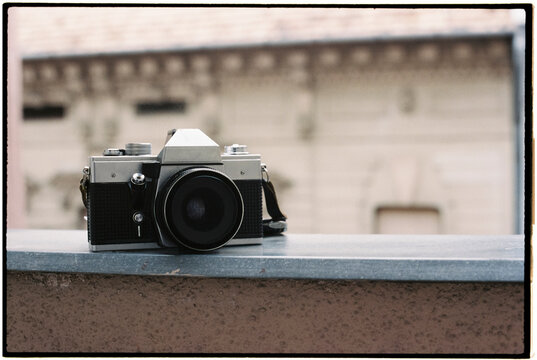 old film camera on the balustrade, 35mm