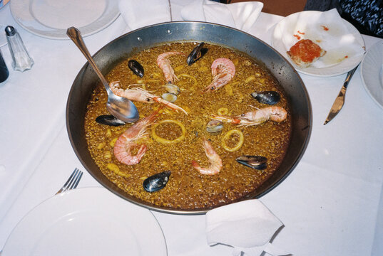 spanish seafood paella in the pan, 35mm
