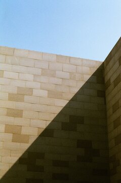Light And Shadow Falls On A Brick Wall