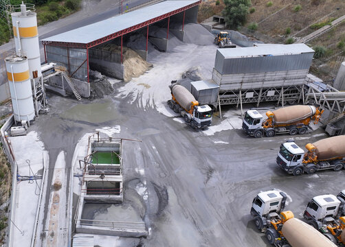 Aerial View of Cement Trucks at an Industrial Construction Site
