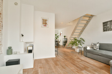 Bright, airy space featuring contemporary furniture, natural light, and minimalist decor that exemplifies modern interior design principles.