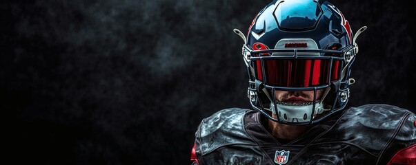 A football player wearing a protective helmet and shoulder pads