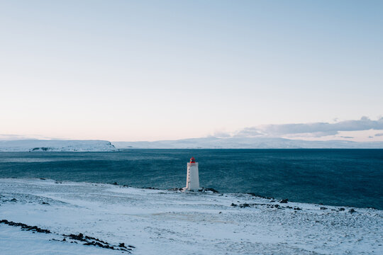 The Arctic Sea with Skardsviti Lighthouse in the foreground