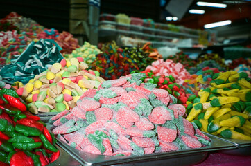 Colorful Candy Display at a Market During a Sunny Afternoon