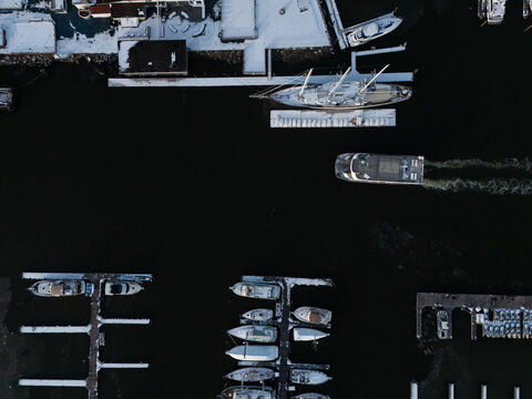 drone View of Marina with Ferry in Motion