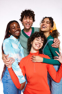 Group of diverse friends hugging