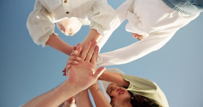 Below, people and hands stack outdoor for vacation agreement, parents security and team building. Family, kids and trust with solidarity for support, holiday games and bonding together of wellness