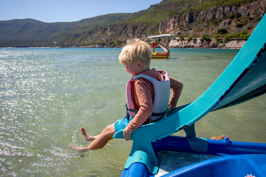 family having fun on catamaran ride