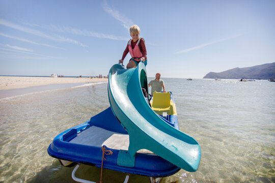 family having fun on catamaran ride