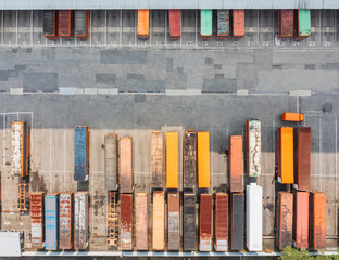 Aerial Image of Colorful and Aging Shipping Containers in a Stor