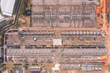 Aerial view of a high-voltage power substation grid
