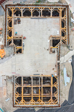 Aerial View of Steel Framework in Basement Construction Site
