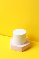 Podiums on a yellow background