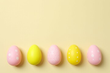 Happy Easter. Colorful eggs on color background, space for text or advertising